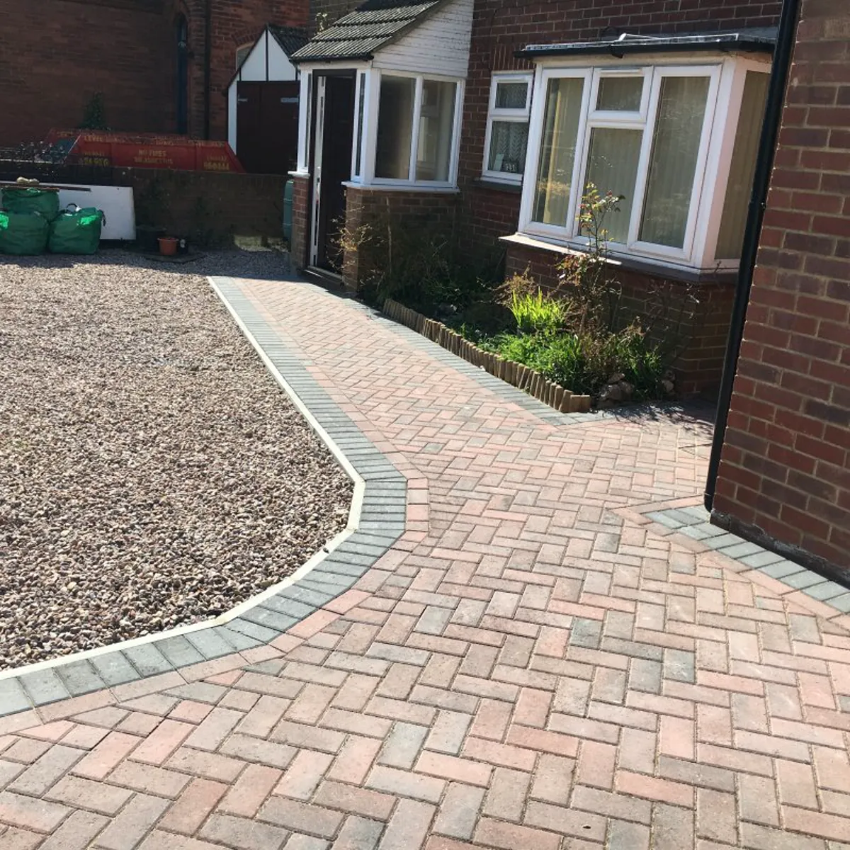 Block-paved garden path with contrasting border